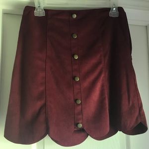 Scalloped skirt with faux buttons